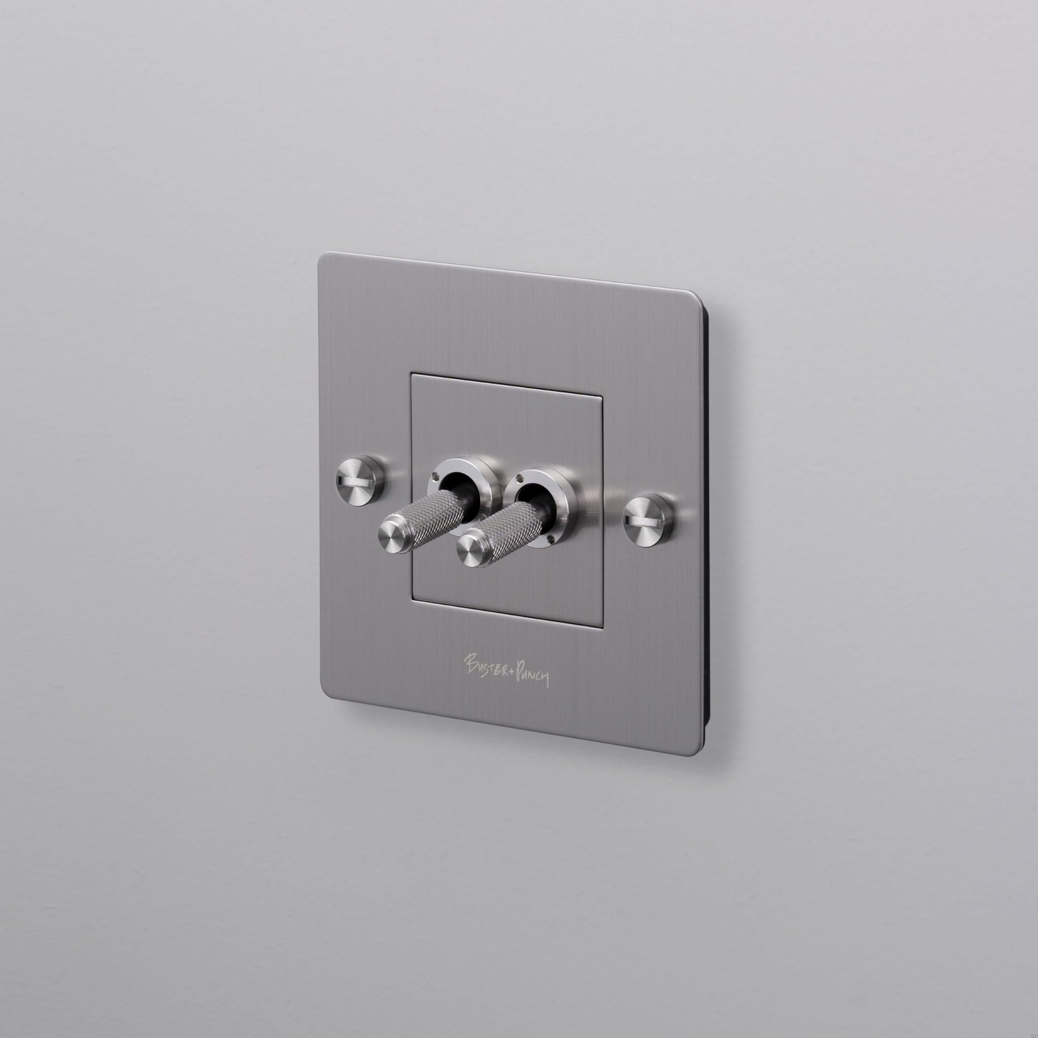 EU_Electrcity_1G_toggle_double_steel_main_Web-scaled.jpg